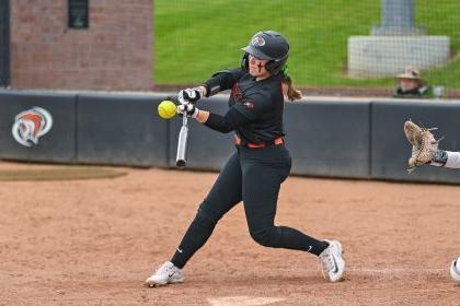 Softball player Amanda Bricker is now a student in the same speech-language pathology program that helped her as a child.